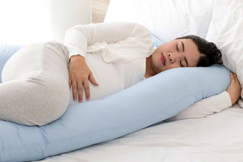 How to sleep with a pregnancy pillow